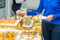 Catering buffet table with food and snacks for guests of the event. Group of people in all you can eat. Dining Food Celebration Pa Royalty Free Stock Photo