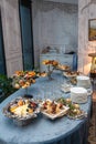 Catering buffet table with fruit, cheese, and appetizers Royalty Free Stock Photo