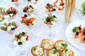 Catering party. Food snacks and appetizers in a glasses on table. Catering banquet table. Cocktail events. Catering services backg Royalty Free Stock Photo