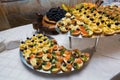 Catering - served table with various snacks, canape