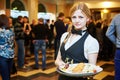 Catering service. waitress on duty Royalty Free Stock Photo