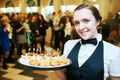 Catering service. waitress on duty Royalty Free Stock Photo