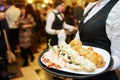 Catering service. waitress on duty Royalty Free Stock Photo