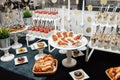 Catering. Snacks and desserts table. Royalty Free Stock Photo