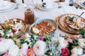 Catering table set service with food and drink at restaurant before wedding party Royalty Free Stock Photo