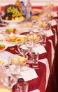 Catering table set service with silverware, napkin and glass at restaurant before party Royalty Free Stock Photo