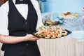 Catering waitress service. woman at restaurant event Royalty Free Stock Photo