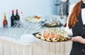 Catering waitress service. woman at restaurant event Royalty Free Stock Photo