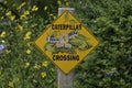 Caterpillar crossing sign