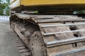 Caterpillar drive of a large excavator, visible up close.