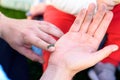 Close up of Caterpillar on man`s hand. Royalty Free Stock Photo