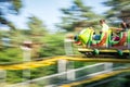 Caterpillar rollercoaster in funpark Royalty Free Stock Photo