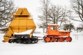 Caterpillar tractor DT-75B and mechanical peat collecting machine MTF-43 Royalty Free Stock Photo