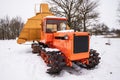 Caterpillar tractor DT-75B and mechanical peat collecting machine MTF-43 Royalty Free Stock Photo