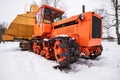 Caterpillar tractor DT-75B and mechanical peat collecting machine MTF-43 Royalty Free Stock Photo