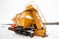 Caterpillar tractor DT-75B and mechanical peat collecting machine MTF-43 Royalty Free Stock Photo