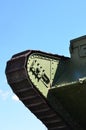 Caterpillars of the green British tank of the Russian Army Wrangel in Kharkov against the blue sk