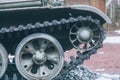 Caterpillars of the tank, side view. Military tank, closeup