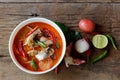 Catfish in sour and spicy creamy Tom Yum soup in bowl