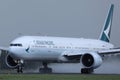 Cathay Pacific aircraft landing on Schiphol Airport, AMS