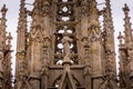 The Cathedral of Barcelona, detail of the main spire in typical gothic style with stone friezes and gargoyles. Barri Gotic,