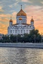 Cathedral Of Christ The Saviour in Moscow in orange sunset light from the Moscow river. Royalty Free Stock Photo