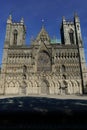 cathedral with a clock and stone floors in the sunbeam