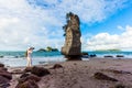 Cathedral Cove. Woman taking pictures Royalty Free Stock Photo