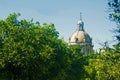 Cathedral dome surrounded by green trees, summer