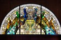 Cathedral glass depicting colorful peacocks