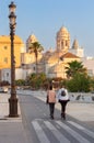 Cathedral of the Holy Cross on the Cadiz waterfront at dawn. Royalty Free Stock Photo