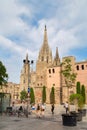 Cathedral of the Holy Cross and Saint Eulalia against a beautiful sky with clouds, Barri Gothic Quarter in Barcelona Royalty Free Stock Photo