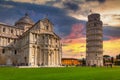 Cathedral and the Leaning Tower of Pisa at sunset, Italy biggest landmark Royalty Free Stock Photo