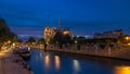 Cathedral Notre Dame de Paris day to night timelapse after sunset in Paris, France. Royalty Free Stock Photo