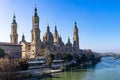 Cathedral of Our Lady of the Pilla under a blue sky in Zaragoza, Spain