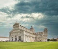 Cathedral of Pisa and Leaning Tower, Romanesque architecture in Tuscany. The bell tower of the cathedral is famous for its tilt Royalty Free Stock Photo