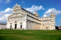 The Cathedral of Pisa and the Pisa Tower in Pisa, Italy. The leaning tower of Pisa is one of the most famous tourist destinations Royalty Free Stock Photo