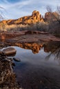 Cathedral Rock in Sedona, Arizona - from the Crescent Moon Picnic Area, reflection in Oak Creek water Royalty Free Stock Photo