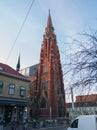 Cathedral of Saints Peter and Paul in Osijek during a sunny evening. City landscape from the street Royalty Free Stock Photo