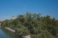 Cathedral of Santa Maria Assunta`s bell tower over trees on island of Torcello, Venice, Italy Royalty Free Stock Photo