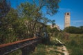 Cathedral of Santa Maria Assunta`s bell tower under blue sky on island of Torcello, Venice, Italy Royalty Free Stock Photo