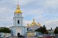 Cathedral on Sofievskaya Square in Kiev. Temple. Golden domes of the temple. Urban nature. Temple on a background of blue sky with