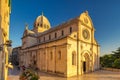 The Cathedral of St. James at sunset, a triple-nave basilica in