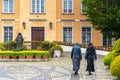 The Cathedral of St. John the Baptist in WrocÃâaw, with nuns walking to the Nunnery located in the OstrÃÂ³w Tumski district