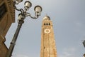 Cathedrale di Santa Maria Assunta, church clock tower in Chioggia, Italy, sunny day, blue sky Royalty Free Stock Photo