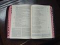 A Catholic bible on top of a table for prayer