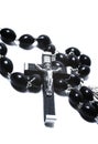 Catholic black wooden beads with metal crucifix Royalty Free Stock Photo