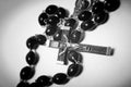 Catholic black wooden beads with metal crucifix Royalty Free Stock Photo