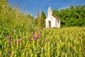 Catholic chapel in rural agricultural landscape Royalty Free Stock Photo