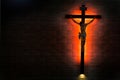 Catholic Christian Crucifix in silhouette flushed right. Royalty Free Stock Photo